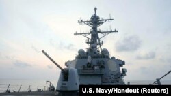 The Arleigh Burke-class guided-missile destroyer USS Milius (DDG-69), deployed to the U.S. 7th Fleet area of operations, conducts underway operations, at an undisclosed location in South China Sea, in this picture released April 10, 2023. (U.S. Navy/Handout via Reuters)