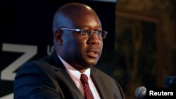 FILE PHOTO: Zimbabwe's Minister of Mines Winston Chitando speaks at a mining investment conference in Harare, Zimbabwe, February 28, 2018.REUTERS/Philimon Bulawayo