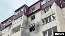 A view shows a damaged apartment block hit by shelling, what local authorities called a Ukrainian military strike, in Belgorod, Russia, March 17, 2024. Governor of Belgorod Region/Vyacheslav Gladkov via Telegram/Handout via Reuters.