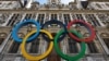 FILE - The Olympic rings are seen in front of the Hotel de Ville City Hall in Paris, France, March 14, 2023. 