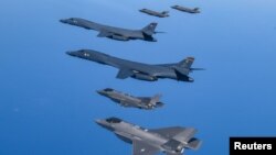 U.S. Air Force B-1B bombers, F-16 fighter jets and South Korean Air Force F-35A take part in a joint air drill, South Korea, March 19, 2023. (South Korean Defense Ministry/Handout via Reuters) 