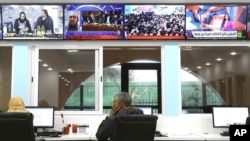 Journalists work at a private television broadcaster in Algiers, Algeria, March 19, 2024. 