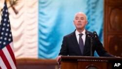 FILE - U.S. Homeland Security Secretary Alejandro Mayorkas takes part in a news conference at the National Palace in Guatemala City, March 21, 2024.
