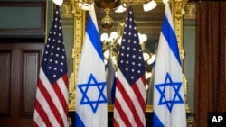 Israeli and American flags appear before a meeting between Vice President Kamala Harris and Israeli Prime Minister Benjamin Netanyahu at the Vice President's Ceremonial Office on the White House complex in Washington, July 25, 2024.