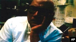 美国司法部提供的针对马玉清的刑事起诉书中的这张照片是2019年1月联邦调查局卧底探员在与其会面时拍摄的视频截图。（美联社照片）