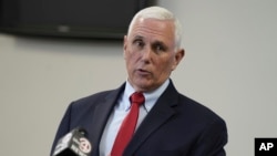 FILE - Former Vice President Mike Pence speaks with reporters following a roundtable discussion on police reform, March 2, 2023, in North Charleston, South Carolina.