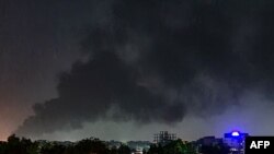 Moshi ukifuka juu ya majengo katika jiji la Khartoum tarehe 19, Mei 2023. Picha na shirika la habari la AFP. 