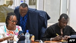 FILE - Chad's Prime Minister Succes Masra, who is running against the transitional president, checks the vote's results at his residence in N'Djamena on May 8, 2024. 