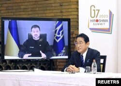 سخنرانی ویدیویی ولودیمیر زلنسکی در نشست مجازی رهبران هفت کشور صنعتی جهان، جی٧، به ریاست فومیو کیشیدا نخست‌وزیر ژاپن. جمعه ۲۴ فوریه ۲۰۲۳