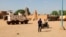 FILE - U.N. forces patrol the streets of Timbuktu, Mali, on Sept. 26, 2021. The United Nations is in the midst of a six-month exit from Mali on orders of the West African nation’s military junta. Residents of northern Mali now say they are effectively stuck in a war zone.