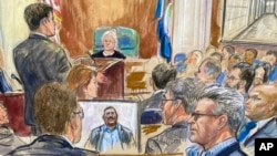 FILE - This artist sketch depicts Salah Al-Ejaili, foreground right with glasses, before the U.S. District Court in Alexandria, Virginia, April 16, 2024.