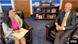 Congressman Adam Smith talking with VOA's Navbahor Imamova, Washington, May 1, 2024.