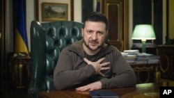 FILE - In this image from video provided by the Ukrainian Presidential Press Office, Ukrainian President Volodymyr Zelenskyy speaks from Kyiv, Ukraine, April 16, 2022.