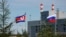 FILE - North Korean and Russian flags are seen at the Vostochny cosmodrome outside Tsiolkovsky, in the far eastern Amur region, Russia, Sept. 13, 2023. Russia's Vladimir Putin will pay a state visit to North Korea June 18-19, 2024. 