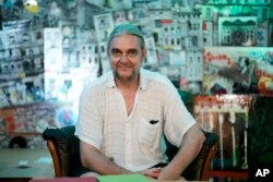 Oliver Waack-Juergensen, who heads the High Ground "cannabis social club," poses for a portrait at the Cannabis Museum in Berlin on Aug. 15, 2023. He said Germany's cannabis plan "is overregulation, a continued stigmatization of cannabis users and a much too tight regulatory corset."