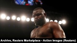 Mobeti bibotu Martin Bakole nsima na kobunda na Kevin Johnson na Newcastle, Grande-Bretagne, 16 sanza ya zomi 2012. Action Images Archive, Reuters Marketplace - Action Images