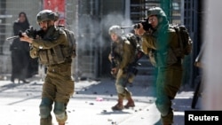 Israel mengatakan pasukan keamanannya menembak mati tiga warga Palestina yang dipersalahkan karena membunuh seorang perempuan Inggris-Israel dan dua putrinya bulan lalu. (Foto: Reuters)