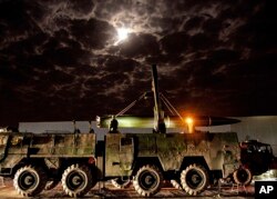 In this Xinhua News Agency photo, a Chinese missile takes part in operations during the combat readiness patrol and military exercises around the Taiwan Island on Friday, April 7, 2023. (Liu Mingsong/Xinhua via AP)