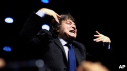 Argentina's President Javier Milei gestures to the audience after giving a speech at CPAC Brasil 2024, a conservative event, in Balneario Camboriu, Santa Catarina state, Brazil, July 7, 2024. 