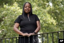Philadelphia school district teacher Rhonda Hicks poses for a portrait at her home in Philadelphia, Thursday, July 20, 2023.