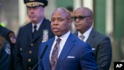 FILE - New York City Mayor Eric Adams speaks in New York's Times Square during a news conference, Dec. 30, 2022. (AP Photo/Ted Shaffrey, File)
