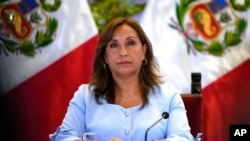 FILE - Peruvian President Dina Boluarte gives a press conference at the government palace in Lima, Peru, Feb. 10, 2023. 