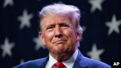 Republican presidential candidate former president Donald Trump speaks at the Republican Party of Iowa's 2023 Lincoln Dinner in Des Moines, Iowa, July 28, 2023.