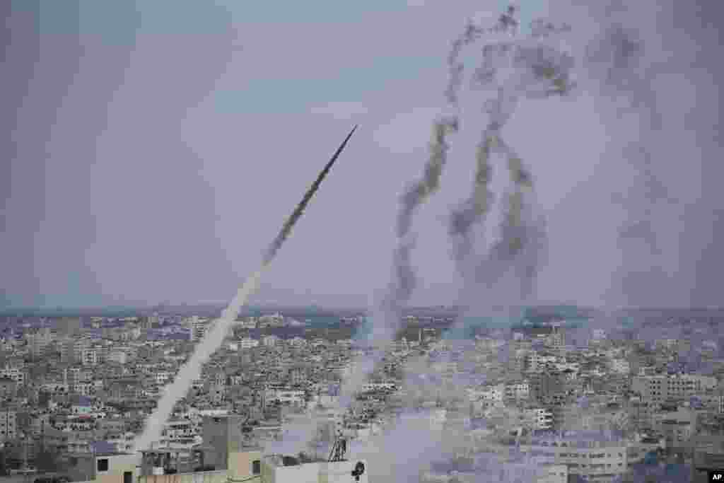 Rockets are launched by Palestinian militants from the Gaza Strip towards Israel on Oct. 7, 2023.