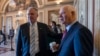 FILE - Sen. Tim Kaine, D-Va., left, and Sen. Ben Cardin, D-Md., both members of the Foreign Relations Committee, are pictured on Capitol Hill in Washington, Aug. 3, 2017.