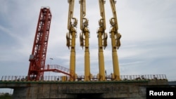 FILE - A Chinese-built port terminal is seen outside Kyaukphyu, Myanmar, May 18, 2017.