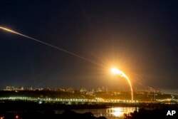 Ukrainian air defense intercepts a Shahed drone mid-air in the third Russia aerial attack on the capital in the last 24 hours in Kyiv, Ukraine, May 30, 2023.