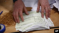 Counting in progress for the twin referendum to change the Constitution on family and care continues at the Royal Dublin Society (RDS), in Dublin, March 9, 2024.