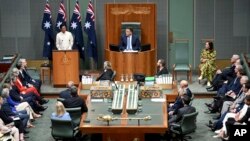 Philippines President Ferdinand Marcos Jr., top left, delivers an address to members and senators at Parliament House in Canberra, Australia, Feb. 29, 2024. (Lukas Coch/AAP Image via AP)