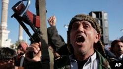 Houthi supporters attend a rally in support of the Palestinians in the Gaza Strip and against the U.S.-led airstrikes on Yemen, in Sanaa, Yemen, Jan. 26, 2024.