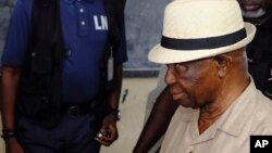 Opposition candidate Joseph Boakai arrives to vote in the second round of presidential elections in Monrovia, Liberia, Nov. 14, 2023.