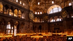 FILE - Muslim worshippers pray during the Muslim holy fasting month of Ramadan at Hagia Sophia mosque in Istanbul, Turkey, April 14, 2023.