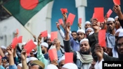 Supporters of the Islami Andolan Bangladesh party attend a rally at the Baitul Mokarram National Mosque in Dhaka on Jan. 9, 2024, protesting what they called a "dummy election."