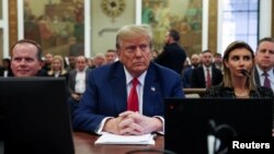Former U.S. President Donald Trump, with lawyers Christopher Kise, left, and Alina Habba, attends the closing arguments in the Trump Organization civil fraud trial at New York State Supreme Court in New York, Jan. 11, 2024.