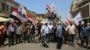 Iraqis Protest Dinar Deterioration After US Ban on Iraqi Banks 