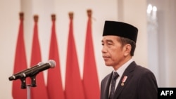 Indonesia's President Joko Widodo attends the swearing-in ceremony of ministers and a deputy minister at the Presidential Palace in Jakarta, Aug. 19, 2024.