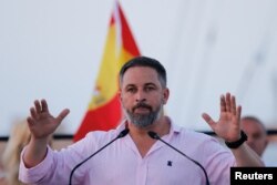 FILE - Spain's far-right Vox party leader Santiago Abascal gestures as he speaks during an opening campaign rally ahead of the July 23 snap election, in Puerto Almerimar, El Ejido, Spain, July 6, 2023.