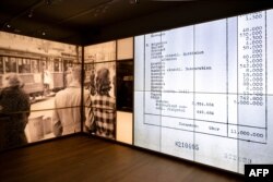 FILE - A photograph taken at the National Holocaust Museum in Amsterdam on March 5, 2024, shows projections on the walls, during a press preview ahead of its opening.