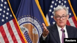 เจอโรม พาวเวลล์ ประธานระบบธนาคารกลางสหรัฐฯ กล่าวระหว่างการแถลงข่าวหลังการประชุมคณะกรรมการกำหนดนโยบายการเงินของระบบธนาคารกลางสหรัฐฯ (FOMC) ที่กรุงวอชิงตัน เมื่อ 14 มิถุนายน 2023