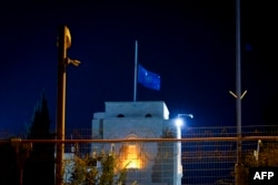 The U.N. flag flies at half-staff at the United Nations headquarters in Jerusalem on Nov. 13, 2023.