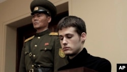 FILE - Matthew Miller, a U.S. citizen, sits on the dock at the Supreme Court during his trial in Pyongyang, North Korea, Sept. 14, 2014.