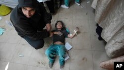 Palestinians wounded in the Israeli bombardment of the Gaza Strip are brought to Al Aqsa hospital in Deir al Balah, Gaza Strip, March 8, 2024.