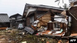 This picture shows damaged homes in the town of Misaki in Suzu city, Ishikawa prefecture on Jan. 7, 2024, after a major 7.5 magnitude earthquake struck the Noto region on New Year's Day.