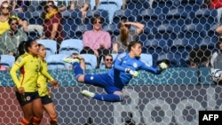 Colombia's goalkeeper Catalina Perez (R) makes a save during a World Cup match between Colombia and South Korea at Sydney Football Stadium in Sydney on July 25, 2023.