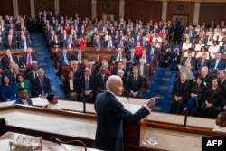 Presiden AS Joe Biden menyampaikan pidato kenegaraan di House Chamber of the US Capitol di Washington, DC, pada 7 Maret 2024. (Foto: Alex Brandon/AFP)