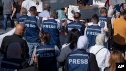 Palestinski novinari u protestnoj šetnji ka kancelariji UN u Ramali 7. novembar 2023.